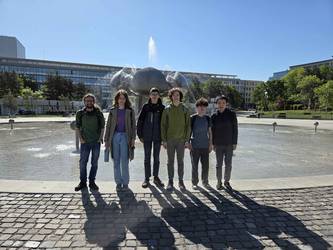 group picture in front of "beach"