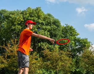 Elias throwing a frisbee